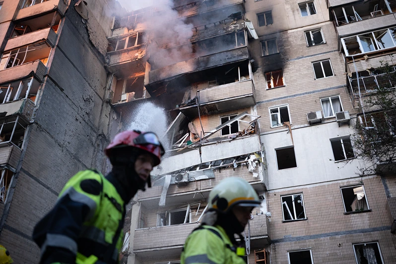 Firefighters work at a heavily damaged residential building following Russian drone and missile strikes in Kyiv on September 7, 2025, amid the Russian invasion of Ukraine. Russia fired its biggest-ever aerial barrage at Ukraine early on September 7, setting the seat of the Ukrainian government in Kyiv ablaze, authorities said. (Photo by Oleksandr Magula / AFP) (Photo by OLEKSANDR MAGULA/AFP via Getty Images)
