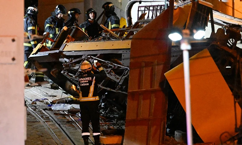 Firefighters work the scene at Gloria funicular derail site on September 03, 2025 in Lisbon, Portugal. Fifteen people were killed and around 20 injured when a car on the Glória Funicular derailed in Lisbon. The iconic funicular railway line, also called Elevador da Glória, connects Lisbon's Restauradores Square to the neighborhood of Bairro Alto via a steep 275 meter (900ft) climb, and is popular among tourists. (Photo by Horacio Villalobos/Getty Images)