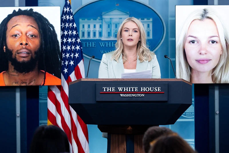 White House Press Secretary Karoline Leavitt speaks alongside a photo of Ukrainian refugee Iryna Zarutska, who was allegedly killed by Decarlos Brown Jr., on a light rail train in Charlotte, North Carolina, during a press briefing in the Brady Press Briefing Room of the White House in Washington, DC, September 9, 2025. (Photo by SAUL LOEB / AFP) (Photo by SAUL LOEB/AFP via Getty Images)