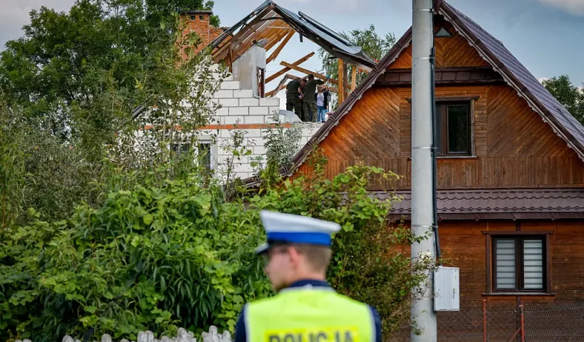 Police and army inspect damage to a house destroyed by debris from a shot down Russian drone in the village of Wyryki-Wola, eastern Poland, on September 10, 2025. NATO air defences helped counter drones that entered Polish airspace overnight and alliance chief Mark Rutte is in contact with Warsaw, a NATO spokeswoman said Wednesday. Polish Prime Minister Donald Tusk said Wednesday that a violation of Polish airspace by several Russian drones overnight was a major provocation aimed at the EU and NATO member. (Photo by Wojtek RADWANSKI / AFP) (Photo by WOJTEK RADWANSKI/AFP via Getty Images)