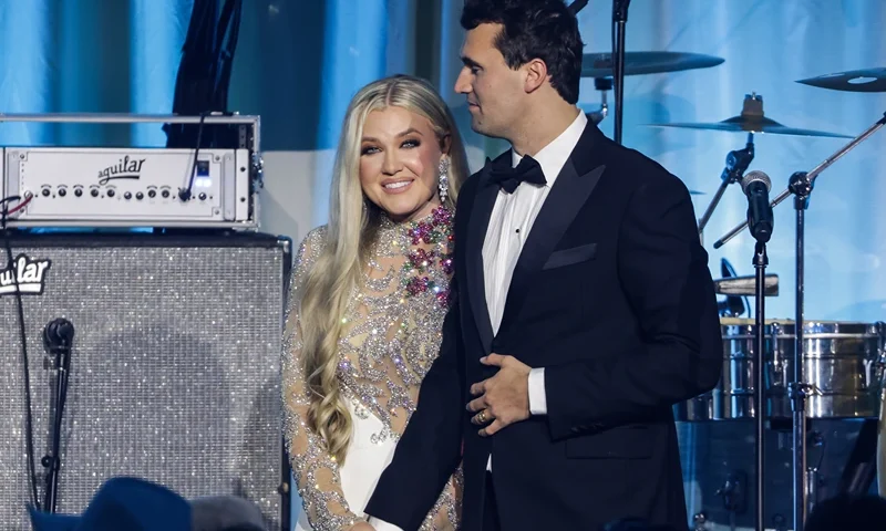 WASHINGTON, DC - JANUARY 19: Charlie Kirk (R) and and his wife Erika Lane Frantzve (L) on stage during the Turning Point USA Inaugural-Eve Ball at the Salamander Hotel on January 19, 2025 in Washington, DC. (Photo by Samuel Corum/Getty Images)