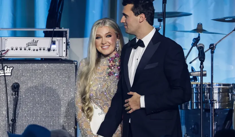 WASHINGTON, DC - JANUARY 19: Charlie Kirk (R) and and his wife Erika Lane Frantzve (L) on stage during the Turning Point USA Inaugural-Eve Ball at the Salamander Hotel on January 19, 2025 in Washington, DC. (Photo by Samuel Corum/Getty Images)