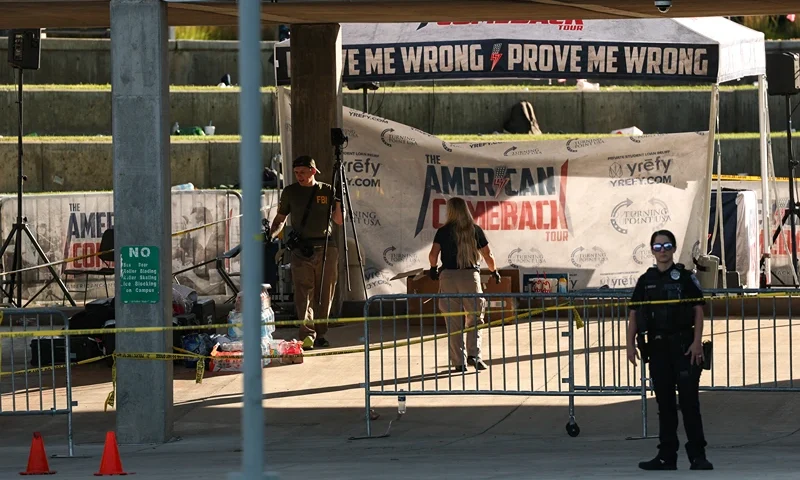 Law enforcement officials work near the crime scene where political activist Charlie Kirk was shot and killed at Utah Valley University in Orem, Utah, on September 11, 2025. The gunman who shot dead US right-wing youth leader Charlie Kirk in a targeted killing remained at large Thursday but authorities said they have video images of the suspect and have recovered a "high-powered" rifle. Kirk, a 31-year-old superstar on the Republican right who was credited with helping Donald Trump return to the presidency last year, was shot while addressing a large crowd at Utah Valley University on Wednesday. (Photo by Patrick T. Fallon / AFP) (Photo by PATRICK T. FALLON/AFP via Getty Images)