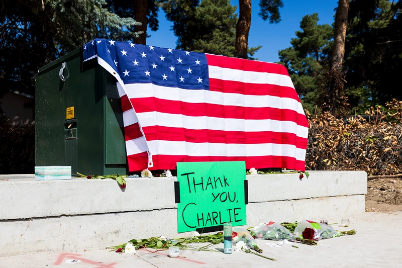 OREM, UTAH - SEPTEMBER 11: A police officer walks out of a building at Utah Valley University as authorities investigate the fatal shooting of political activist Charlie Kirk on September 11, 2025 in Orem, Utah. Authorities have released a "person of interest" as they search for the suspect who shot and killed Kirk, founder of Turning Point USA, while he was speaking at an event for his "American Comeback Tour". (Photo by Michael Ciaglo/Getty Images)