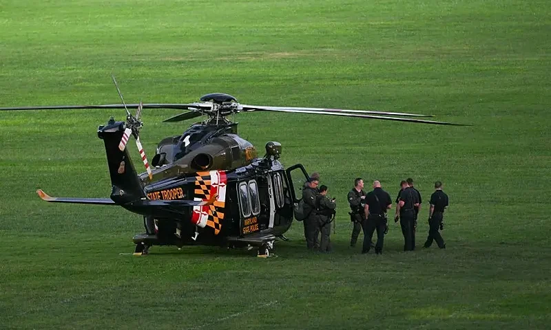 A Maryland State Police medevac helicopter is seen at the US Naval Academy in Annapolis, Maryland, where a shooting occurred earlier in the day, on September 11, 2025. The US Naval Academy in Annapolis, Maryland, went on lockdown on September 11, 2025, after reports of gunfire in Bancroft Hall, though officials later said there was no credible threat. (Photo by Jim WATSON / AFP) (Photo by JIM WATSON/AFP via Getty Images)