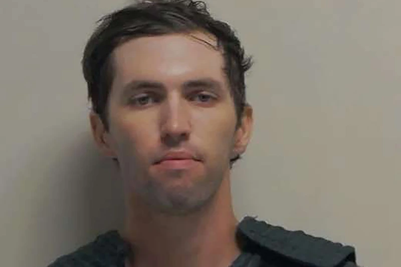 Tyler Robinson stands for a booking photo on September 12, 2025 in Spanish Fork, Utah. Political activist Charlie Kirk, founder of Turning Point USA, was speaking at his "American Comeback Tour" on the campus of Utah Valley University when he was shot in the neck and killed on September 10, 2025 in Orem, Utah. (Photo by Office of the Governor of Utah via Getty Images)
