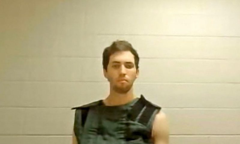 This screengrab from the Utah Court live streaming shows Tyler Robinson, the suspect in the killing of political activist Charlie Kirk, attending a court appearance remotely from his jail cell in Provo, Utah, on September 16, 2025. Robinson has been formally charged with the murder of Kirk, and the prosecution added a notice of intent to seek the death penalty. Six other charges include obstruction of justice and witness tampering. Kirk, a close ally of President Donald Trump, was shot dead last week during a speaking event on a Utah university campus. (Photo by POOL / AFP) (Photo by -/POOL/AFP via Getty Images)
