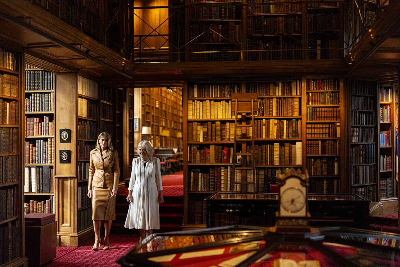 WINDSOR, ENGLAND - SEPTEMBER 18: Queen Camilla and U.S. First Lady Melania Trump tour the Royal Library, during the State visit by the President of the United States of America and U.S. First Lady Melania Trump, on September 18, 2025 in Windsor, England. (Photo by Aaron Chown - WPA Pool/Getty Images)