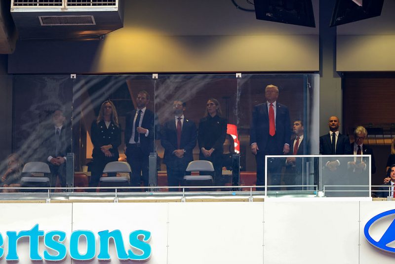 President Trump seated behind bulletproof glass at Charlie Kirk memorial at State Farm Stadium