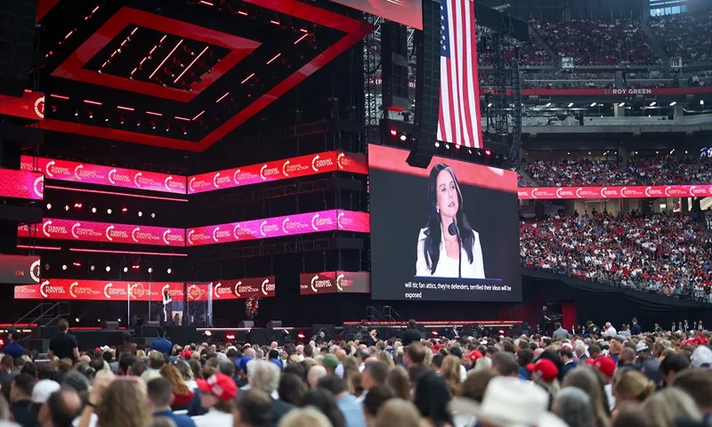 GLENDALE, ARIZONA - SEPTEMBER 21: Director of National Intelligence Tulsi Gabbard speaks during the memorial service for political activist Charlie Kirk at State Farm Stadium on September 21, 2025 in Glendale, Arizona. Kirk, the CEO and co-founder of Turning Point USA, was shot and killed on September 10th while speaking at an event during his "American Comeback Tour" at Utah Valley University. (Photo by Eric Thayer/Getty Images)