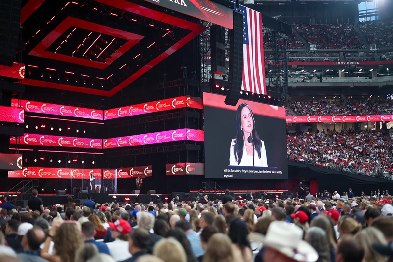 GLENDALE, ARIZONA - SEPTEMBER 21: Director of National Intelligence Tulsi Gabbard speaks during the memorial service for political activist Charlie Kirk at State Farm Stadium on September 21, 2025 in Glendale, Arizona. Kirk, the CEO and co-founder of Turning Point USA, was shot and killed on September 10th while speaking at an event during his "American Comeback Tour" at Utah Valley University. (Photo by Eric Thayer/Getty Images)