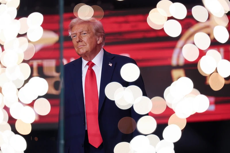 GLENDALE, ARIZONA - SEPTEMBER 21: U.S. President Donald Trump walks onstage during the memorial service for political activist Charlie Kirk at State Farm Stadium on September 21, 2025 in Glendale, Arizona. Kirk, the CEO and co-founder of Turning Point USA, was shot and killed on September 10th while speaking at an event during his "American Comeback Tour" at Utah Valley University. (Photo by Win McNamee/Getty Images)