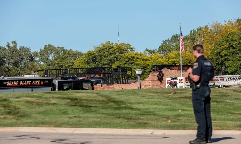 GRAND BLANC, MICHIGAN - SEPTEMBER 28: The burned church as emergency services respond to a shooting and fire at the Church of Jesus Christ of Latter-day Saints on September 28, 2025 in Grand Blanc, Michigan. Police said there are multiple victims and the shooter is down. (Photo by Bill Pugliano/Getty Images)