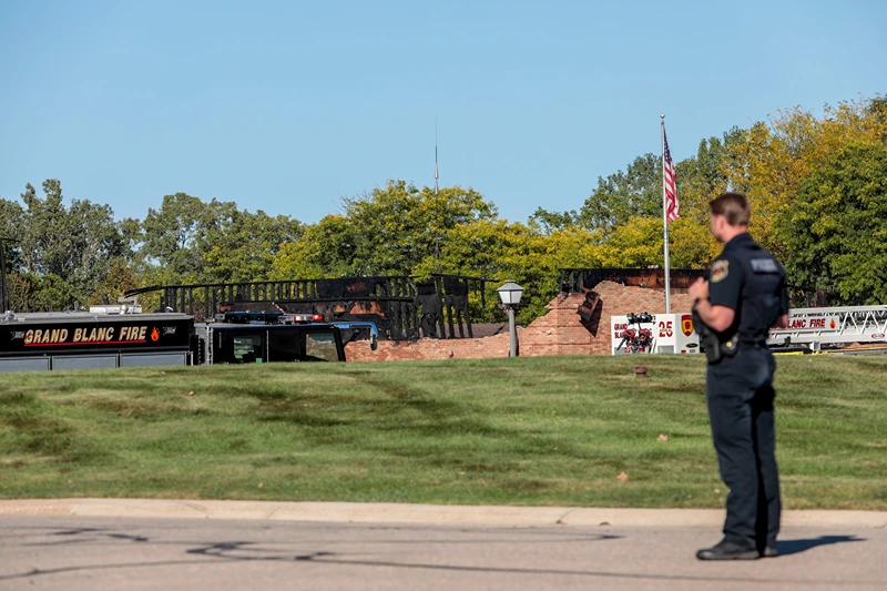 GRAND BLANC, MICHIGAN - SEPTEMBER 28: The burned church as emergency services respond to a shooting and fire at the Church of Jesus Christ of Latter-day Saints on September 28, 2025 in Grand Blanc, Michigan. Police said there are multiple victims and the shooter is down. (Photo by Bill Pugliano/Getty Images)