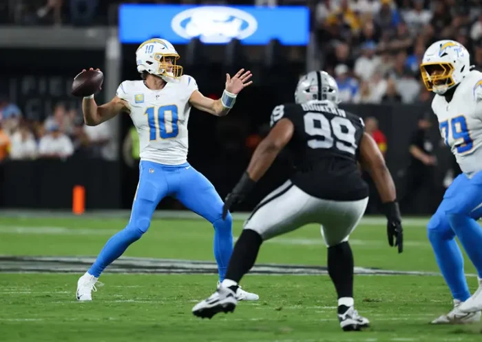 Los Angeles Chargers quarterback Justin Herbert (10) makes a pass during the first quarter against the Las Vegas Raiders at Allegiant Stadium. Mandatory Credit: Kiyoshi Mio-Imagn Images