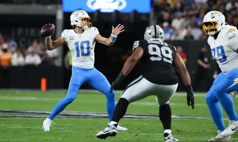 Los Angeles Chargers quarterback Justin Herbert (10) makes a pass during the first quarter against the Las Vegas Raiders at Allegiant Stadium. Mandatory Credit: Kiyoshi Mio-Imagn Images