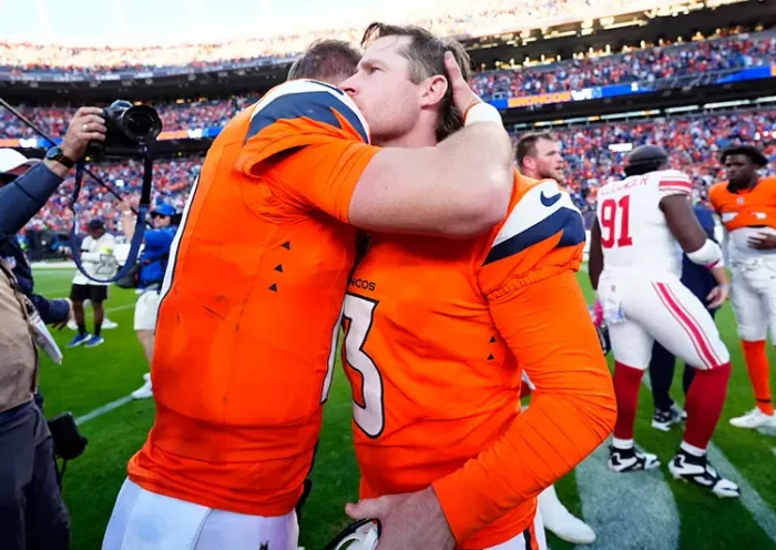 Denver Broncos kicker Wil Lutz (3) and Denver Broncos quarterback Bo Nix (10) celebrate after the win against the New York Giants at Empower Field at Mile High. Mandatory Credit: Ron Chenoy-Imagn Images
