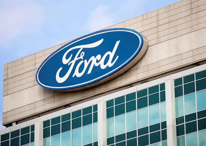A Ford logo is seen on the Ford Motor World headquarters in Dearborn, Michigan, U.S., March 12, 2025. REUTERS/Rebecca Cook/File Photo