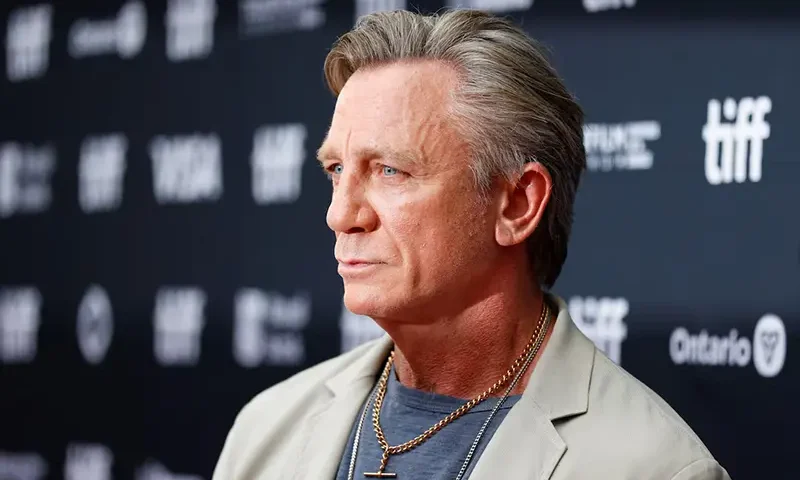 Cast member Daniel Craig poses on the red carpet for "Wake Up Dead Man: A Knives Out Mystery" as the Toronto International Film Festival (TIFF) returns for its 50th edition in Toronto, Ontario, Canada, September 6, 2025. REUTERS/Carlos Osorio
