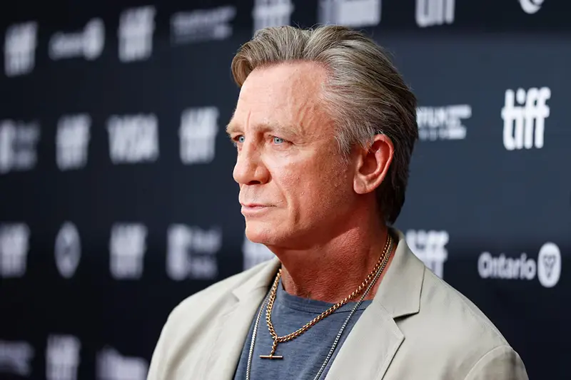 Cast member Daniel Craig poses on the red carpet for "Wake Up Dead Man: A Knives Out Mystery" as the Toronto International Film Festival (TIFF) returns for its 50th edition in Toronto, Ontario, Canada, September 6, 2025. REUTERS/Carlos Osorio