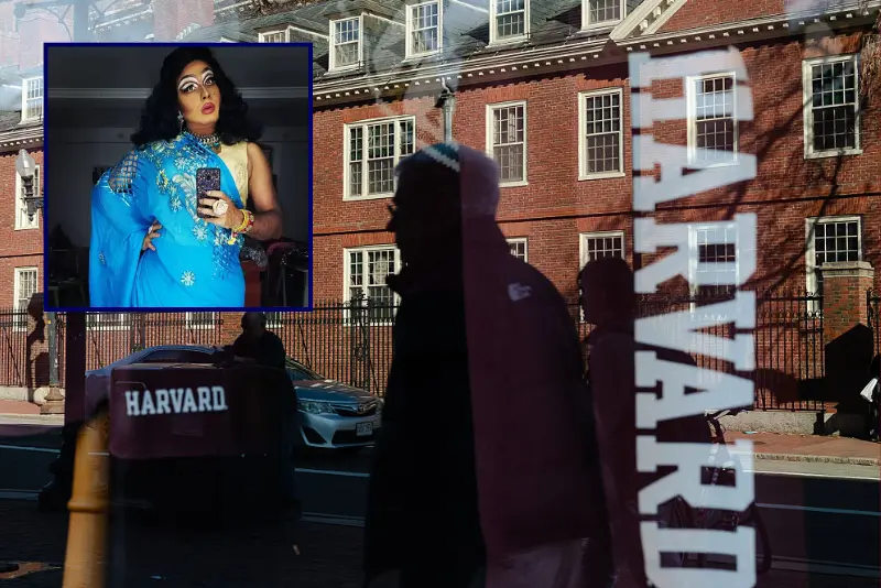 Harvard University is reflected in the window of a merchandise store across the street from the school on April 17, 2025 in Cambridge, Massachusetts. The Trump administration announced that it would block Harvard University from receiving $2.2 billion in federal grants and $60 million in contracts after the school refused demands to adopt new policies relating to student and faculty conduct, admissions, anti-semitism on campus and DEI. (Photo by Sophie Park/Getty Images)
