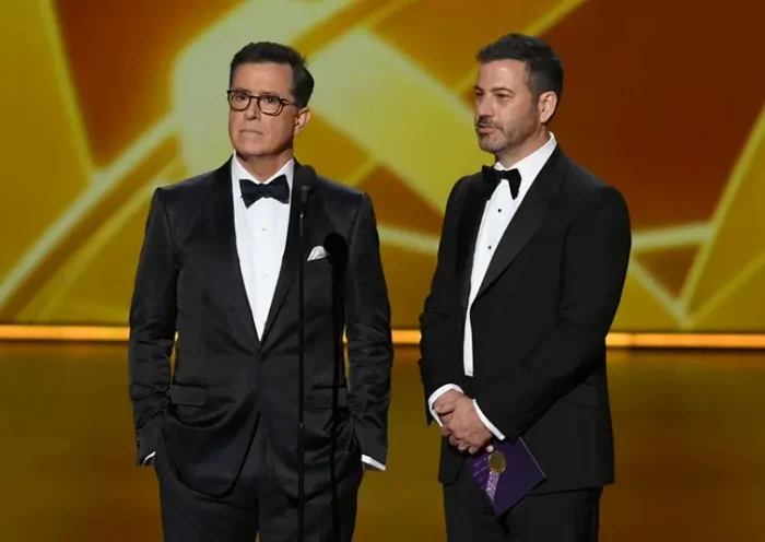 LOS ANGELES, CALIFORNIA - SEPTEMBER 22: (L-R) Stephen Colbert and Jimmy Kimmel speak onstage during the 71st Emmy Awards at Microsoft Theater on September 22, 2019 in Los Angeles, California. (Photo by Kevin Winter/Getty Images)