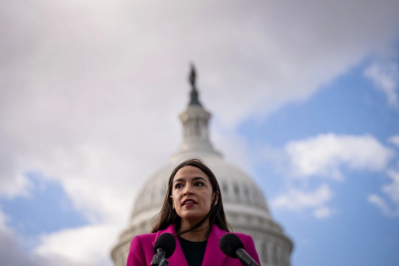WASHINGTON, DC - JANUARY 26: Rep. Alexandria Ocasio-Cortez (D-NY) speaks during a news conference with Democratic lawmakers about the Biden administrations border politics, outside the U.S. Capitol on January 26, 2023 in Washington, DC. A group of 77 Democratic lawmakers sent a letter to President Joe Biden this week criticizing his administrations policies restricting asylum access for migrants crossing the southern border. (Photo by Drew Angerer/Getty Images)