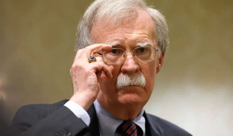 WASHINGTON, DC - AUGUST 17: Former National Security Adviser John Bolton speaks to reporters after speaking in a panel hosted by the National Council of Resistance of Iran – U.S. Representative Office (NCRI-US) at the Willard InterContinental Hotel on August 17, 2022 in Washington, DC. The NCRI-US held the panel to mark the 20th anniversary of their first press conference on the perceived threat of Iran’s nuclear weapons program. Recently the U.S. Justice Department announced charges against an Iranian operative for a plot to murder John Bolton. (Photo by Anna Moneymaker/Getty Images)