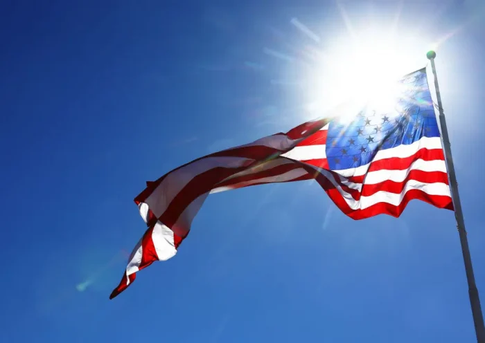 AUSTIN, TEXAS - OCTOBER 20: The flag of the United States flies over the circuit during practice ahead of the F1 Grand Prix of United States at Circuit of The Americas on October 20, 2023 in Austin, Texas. (Photo by Mark Thompson/Getty Images)