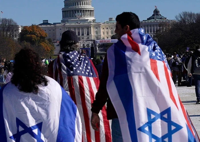 TOPSHOT - Demonstrators in support of Israel gather to denounce antisemitism and call for the release of Israeli hostages, on the National Mall in Washington, DC, on November 14, 2023. Thousands of civilians, both Palestinians and Israelis, have died since October 7, 2023, after Palestinian Hamas militants based in the Gaza Strip entered southern Israel in an unprecedented attack triggering a war declared by Israel on Hamas with retaliatory bombings on Gaza. (Photo by Stefani Reynolds / AFP) (Photo by STEFANI REYNOLDS/AFP via Getty Images)