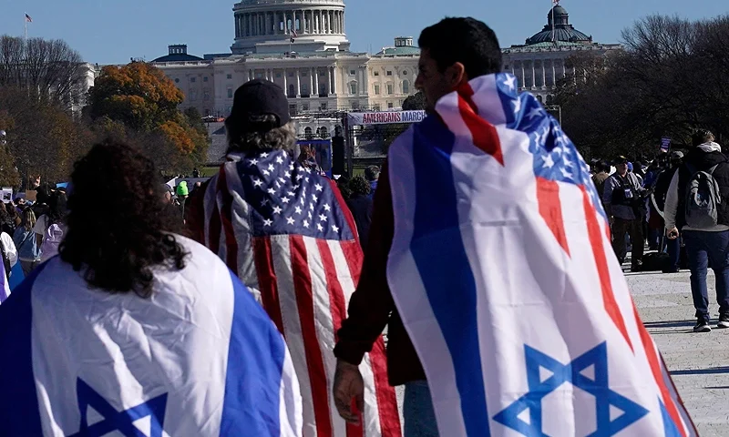 TOPSHOT - Demonstrators in support of Israel gather to denounce antisemitism and call for the release of Israeli hostages, on the National Mall in Washington, DC, on November 14, 2023. Thousands of civilians, both Palestinians and Israelis, have died since October 7, 2023, after Palestinian Hamas militants based in the Gaza Strip entered southern Israel in an unprecedented attack triggering a war declared by Israel on Hamas with retaliatory bombings on Gaza. (Photo by Stefani Reynolds / AFP) (Photo by STEFANI REYNOLDS/AFP via Getty Images)