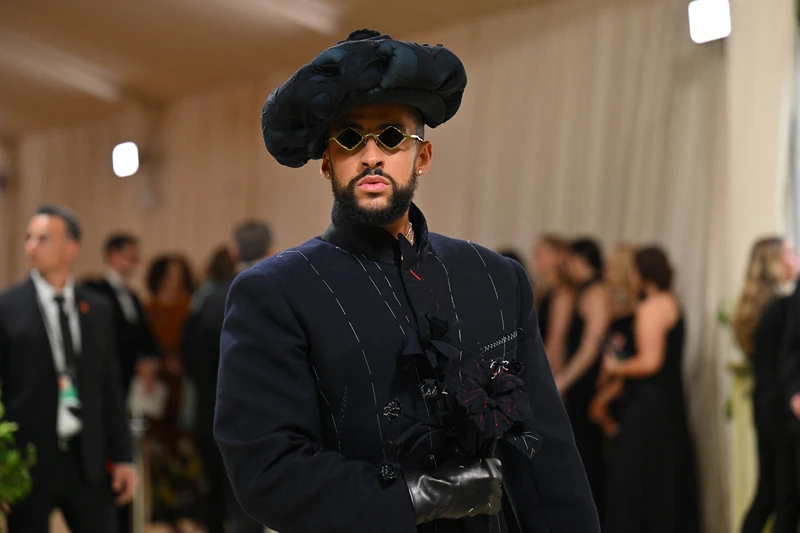 TOPSHOT - Puerto Rican singer Bad Bunny arrives for the 2024 Met Gala at the Metropolitan Museum of Art on May 6, 2024, in New York. The Gala raises money for the Metropolitan Museum of Art's Costume Institute. The Gala's 2024 theme is "Sleeping Beauties: Reawakening Fashion." (Photo by Angela WEISS / AFP) (Photo by ANGELA WEISS/AFP via Getty Images)