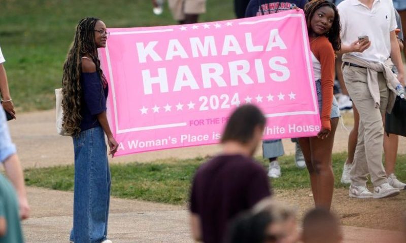 WASHINGTON, DC - NOVEMBER 06: Supporters hold up a sign for Democratic presidential nominee, U.S. Vice President Kamala Harris as they wait to hear her speak at Howard University on November 06, 2024 in Washington, DC. After a contentious campaign focused on key battleground states, the Republican presidential nominee, former U.S. President Donald Trump was projected to secure the majority of electoral votes, giving him a second term as U.S. President. Republicans also secured control of the Senate for the first time in four years. (Photo by Kent Nishimura/Getty Images)