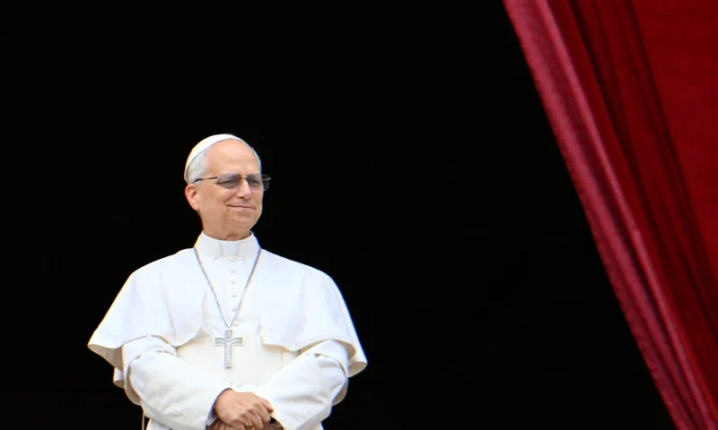 Pope Leo XIV greets the crowd after the Regina Caeli prayer from the main central loggia balcony of St Peter's basilica in The Vatican, on May 11, 2025. (Photo by Alberto PIZZOLI / AFP) (Photo by ALBERTO PIZZOLI/AFP via Getty Images)