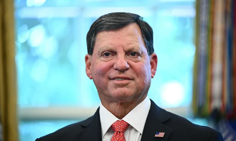 Commissioner of the Social Security Administration Frank Bisignano looks on as US President Donald Trump speaks prior to signing a presidential proclamation honoring the 90th anniversary of the Social Security Act in the Oval Office of the White House in Washington, DC on August 14, 2025. (Photo by Mandel NGAN / AFP) (Photo by MANDEL NGAN/AFP via Getty Images)
