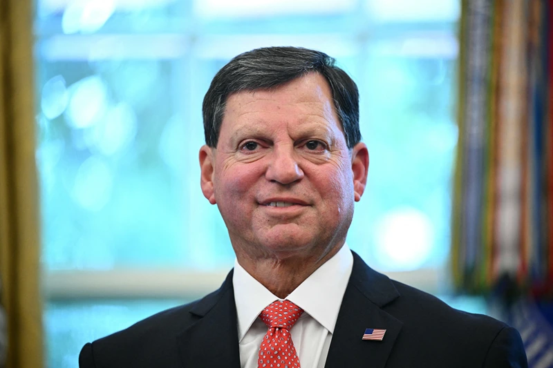 Commissioner of the Social Security Administration Frank Bisignano looks on as US President Donald Trump speaks prior to signing a presidential proclamation honoring the 90th anniversary of the Social Security Act in the Oval Office of the White House in Washington, DC on August 14, 2025. (Photo by Mandel NGAN / AFP) (Photo by MANDEL NGAN/AFP via Getty Images)