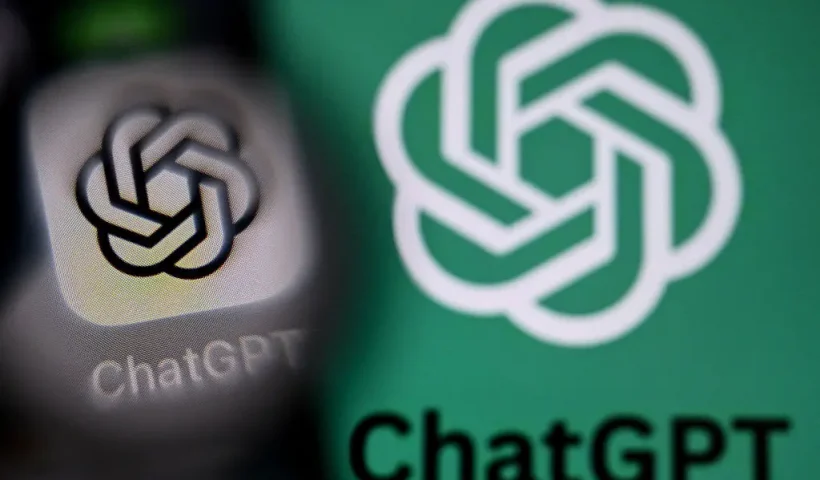 A photo taken on September 1, 2025 shows the logo of ChatGPT on a laptop screen (R) next to the ChatGPT application logo on a smartphone screen in Frankfurt am Main, western Germany. (Photo by Kirill KUDRYAVTSEV / AFP) (Photo by KIRILL KUDRYAVTSEV/AFP via Getty Images)