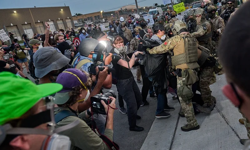 Federal agents violently confront protesters gathered outside of the suburban Chicago ICE Detention Center in Broadview, IL. Sept. 19, 2025. (Photo by Dominic Gwinn / Middle East Images via AFP) (Photo by DOMINIC GWINN/Middle East Images/AFP via Getty Images)
