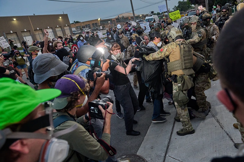 Federal agents violently confront protesters gathered outside of the suburban Chicago ICE Detention Center in Broadview, IL. Sept. 19, 2025. (Photo by Dominic Gwinn / Middle East Images via AFP) (Photo by DOMINIC GWINN/Middle East Images/AFP via Getty Images)
