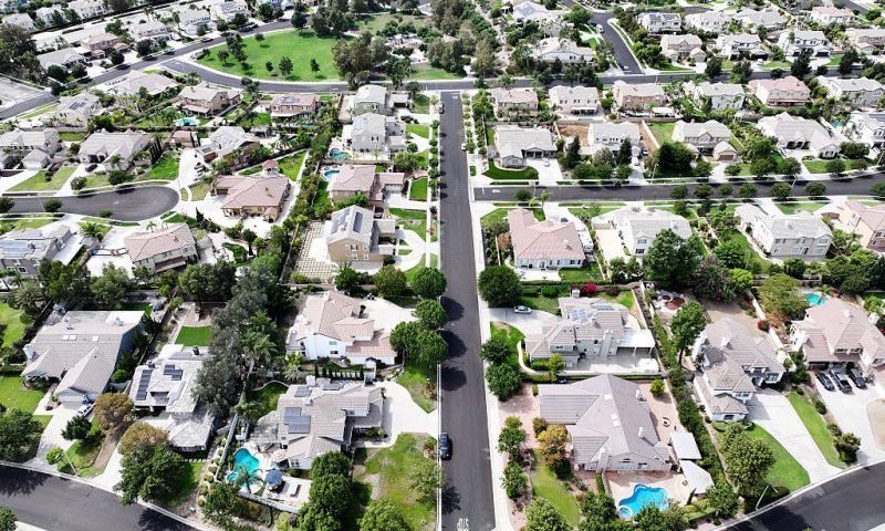 RANCHO CUCAMONGA, CALIFORNIA - SEPTEMBER 17: An aerial view of residential homes on September 17, 2025 in Rancho Cucamonga, California. The 30-year fixed mortgage average rate dropped to 6.13 percent yesterday, the lowest mark since 2022, ahead of today’s Federal Reserve rate cut announcement. (Photo by Mario Tama/Getty Images)