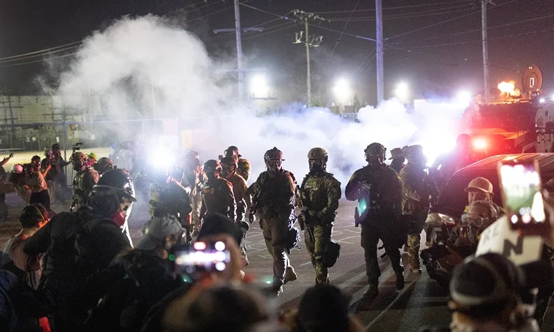 BROADVIEW, ILLINOIS - SEPTEMBER 27: Federal law enforcement agents attack demonstrators protesting outside of an immigrant processing center with a barrage of tear gas and pepper balls on September 27, 2025 in Broadview, Illinois. The demonstrators were protesting a recent surge in ICE apprehensions in the Chicago area, part of a push by the Trump administration dubbed Operation Midway Blitz. (Photo by Scott Olson/Getty Images)