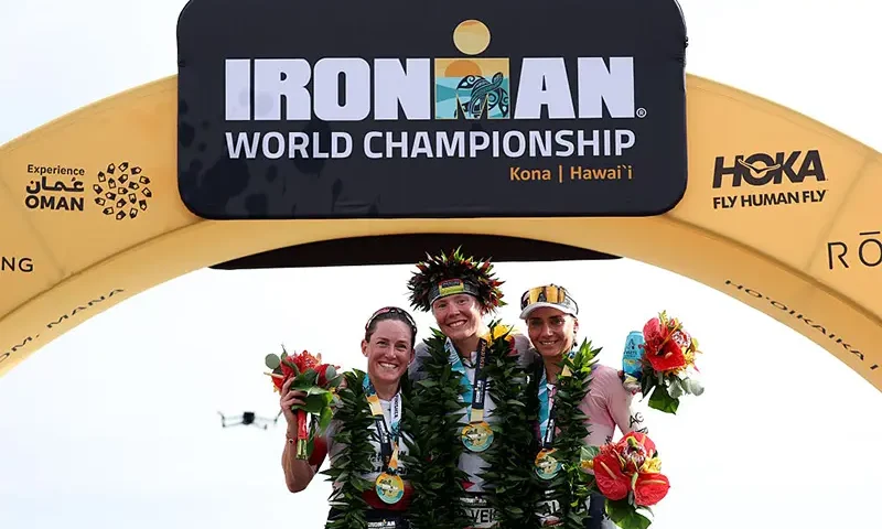 (L-R) Kat Matthews #2 of the United Kingdom, Solveig Lovseth #16 of Norway and Laura Philipp #1 of Germany pose for a photograph after the 2025 IRONMAN World Championship Women's Race on October 11, 2025 in Kailua Kona, Hawaii. (Photo by Sean M. Haffey/Getty Images for IRONMAN)