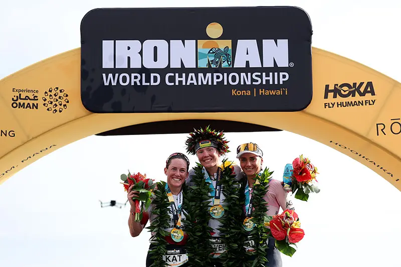 (L-R) Kat Matthews #2 of the United Kingdom, Solveig Lovseth #16 of Norway and Laura Philipp #1 of Germany pose for a photograph after the 2025 IRONMAN World Championship Women's Race on October 11, 2025 in Kailua Kona, Hawaii. (Photo by Sean M. Haffey/Getty Images for IRONMAN)
