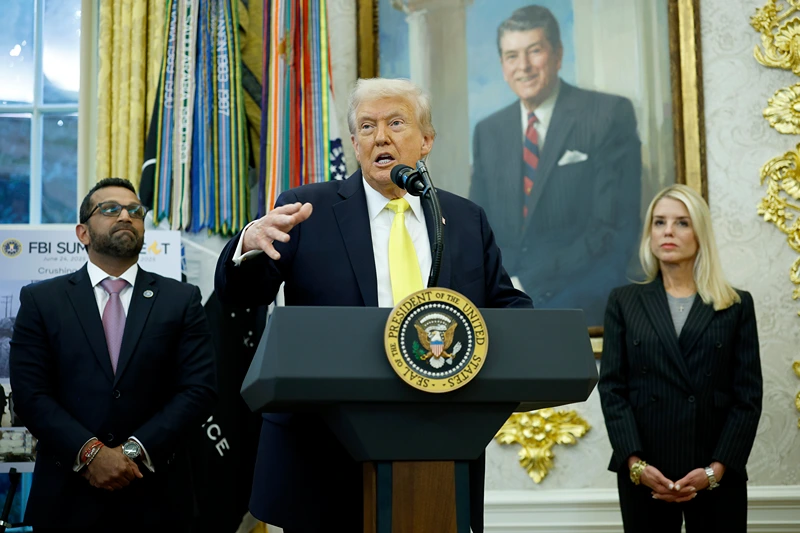 WASHINGTON, DC - OCTOBER 15: U.S. President Donald Trump speaks as Federal Bureau of Investigation Director Kash Patel (L) and U.S. Attorney General Pam Bondi look on during a press conference in the Oval Office of the White House on October 15, 2025 in Washington, DC. Trump and Patel provided an update on the Trump administration’s progress in reducing violent crime. (Photo by Kevin Dietsch/Getty Images)