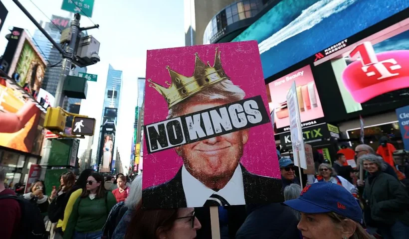 People participate in a "No Kings" national day of protest in New York on October 18, 2025. From New York to San Francisco, millions of Americans are expected to hit the streets to voice their anger over President Donald Trump's policies at nationwide "No Kings" protests. (Photo by TIMOTHY A.CLARY / AFP) (Photo by TIMOTHY A.CLARY/AFP via Getty Images)