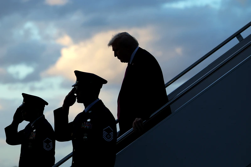 WEST PALM BEACH, FLORIDA - OCTOBER 17: U. S. President Donald Trump walks down the steps of Air Force One after he landed at West Palm Beach International Airport on October 17, 2025 in West Palm Beach, Florida. President Trump is spending his weekend at Mar-a-Lago in Palm Beach, Florida. (Photo by Alex Wong/Getty Images)
