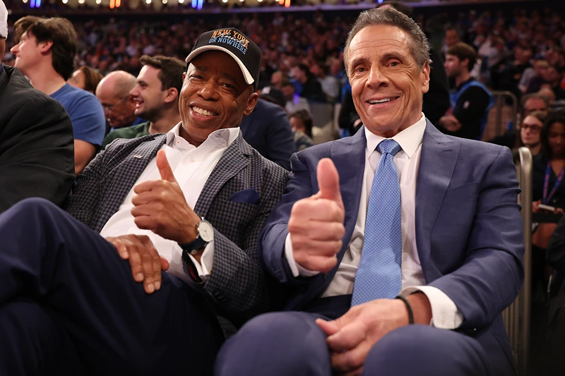 NEW YORK, NEW YORK - OCTOBER 22: New York Mayor Eric Adams poses with Independent candidate former New York Gov. Andrew Cuomo after Cuomo participated in the second debate for the upcoming mayoral election on Wednesday evening during the game between the New York Knicks and the Cleveland Cavaliers at Madison Square Garden on October 22, 2025 in New York City. NOTE TO USER: User expressly acknowledges and agrees that, by downloading and or using this photograph, User is consenting to the terms and conditions of the Getty Images License Agreement. (Photo by Al Bello/Getty Images)