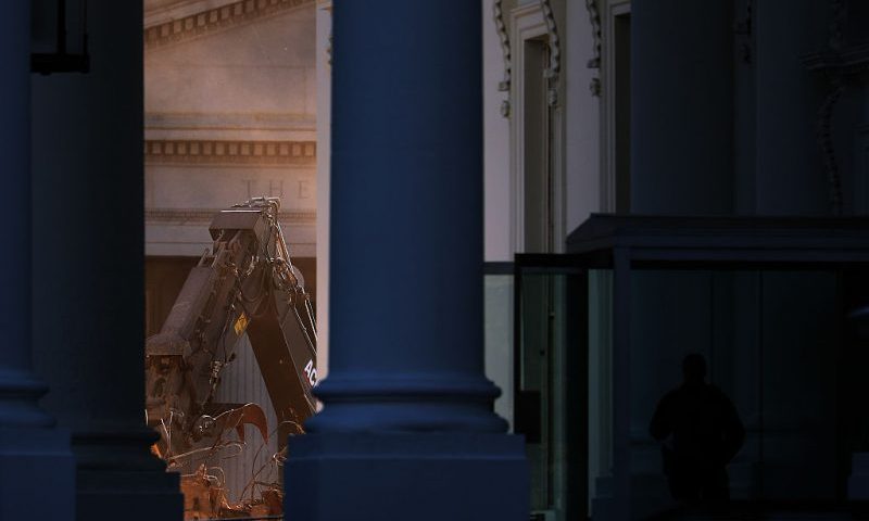 WASHINGTON, DC - OCTOBER 23: The facade of the East Wing of the White House is demolished by work crews on October 23, 2025 in Washington, DC. The demolition is part of U.S. President Donald Trump's plan to build a ballroom reportedly costing $250 million on the eastern side of the White House. ( (Photo by Alex Wong/Getty Images)