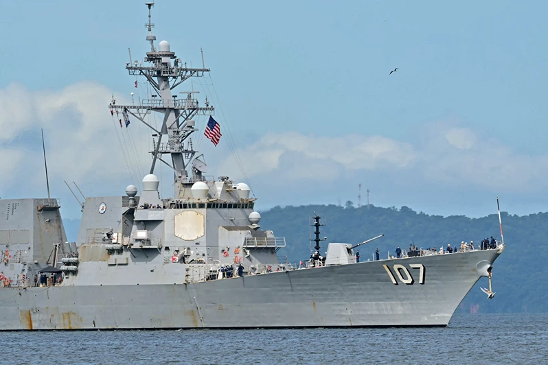 The USS Gravely warship arrives in Port of Spain on October 26, 2025. The US warship will visit Trinidad and Tobago for joint exercises near the coast of Venezuela amid Washington's campaign against alleged drug traffickers in the region. (Photo by Martin BERNETTI / AFP) (Photo by MARTIN BERNETTI/AFP via Getty Images)