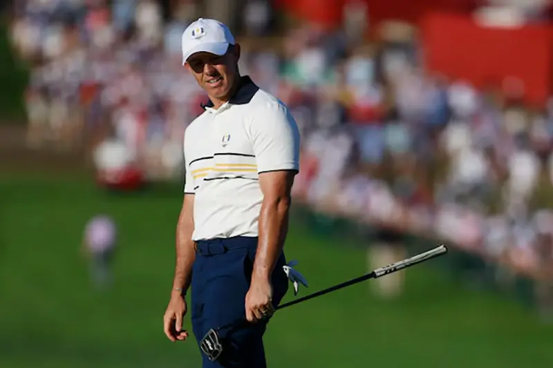 Team Europe's Rory McIlroy reacts after his putt on the 18th hole during the singles IMAGN IMAGES via Reuters/Peter Casey